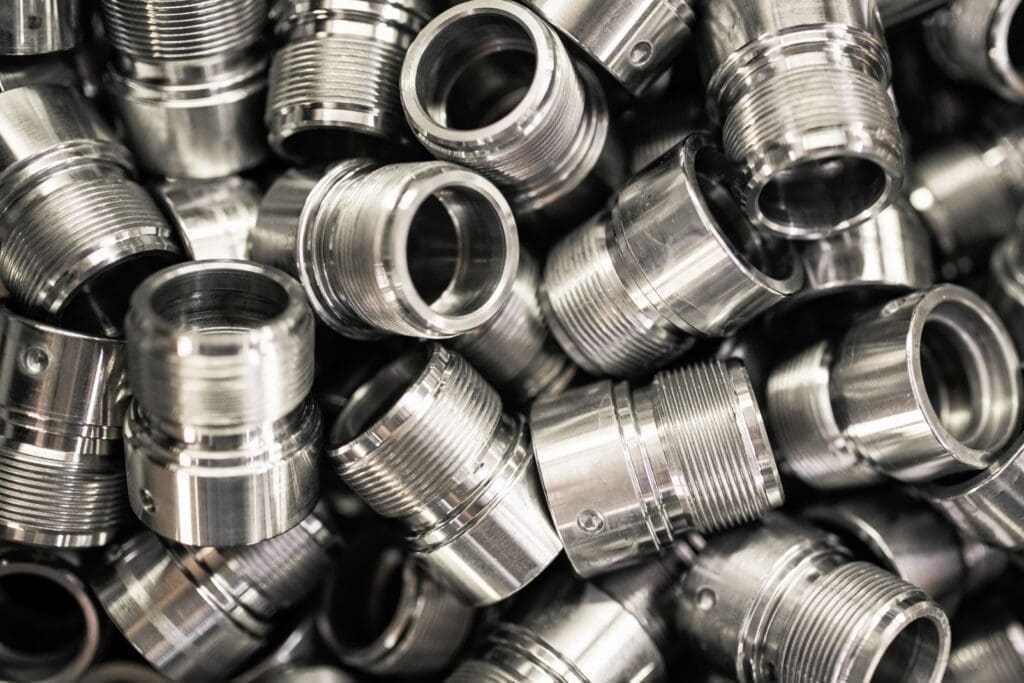 Machined metal parts with thread